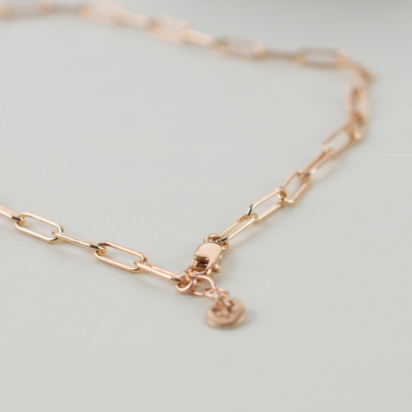 14K Rose Gold Fill Paperclip Chain Necklace with a lobster clasp and a 3 ring adjustable closure